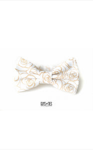 gold roses on white bow tie