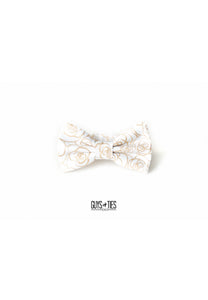 gold roses on white bow tie