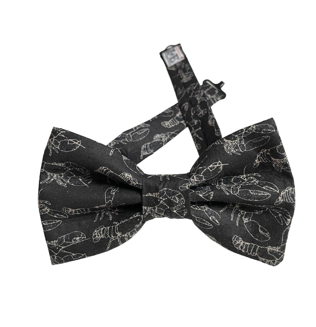 mini lobsters on black bow tie