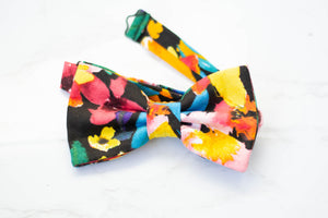 vibrant floral on black bow tie