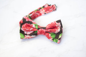 red roses on black bow tie