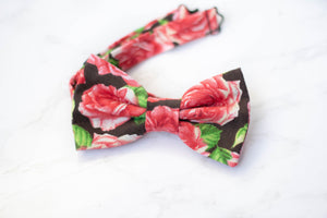 red roses on black bow tie