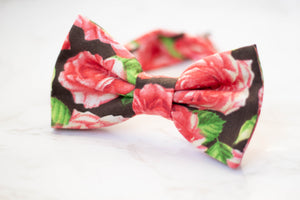 red roses on black bow tie