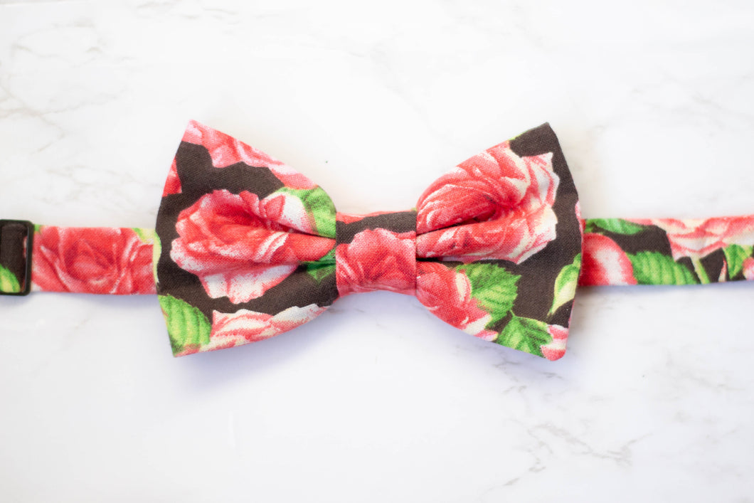 red roses on black bow tie