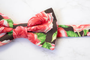 red roses on black bow tie